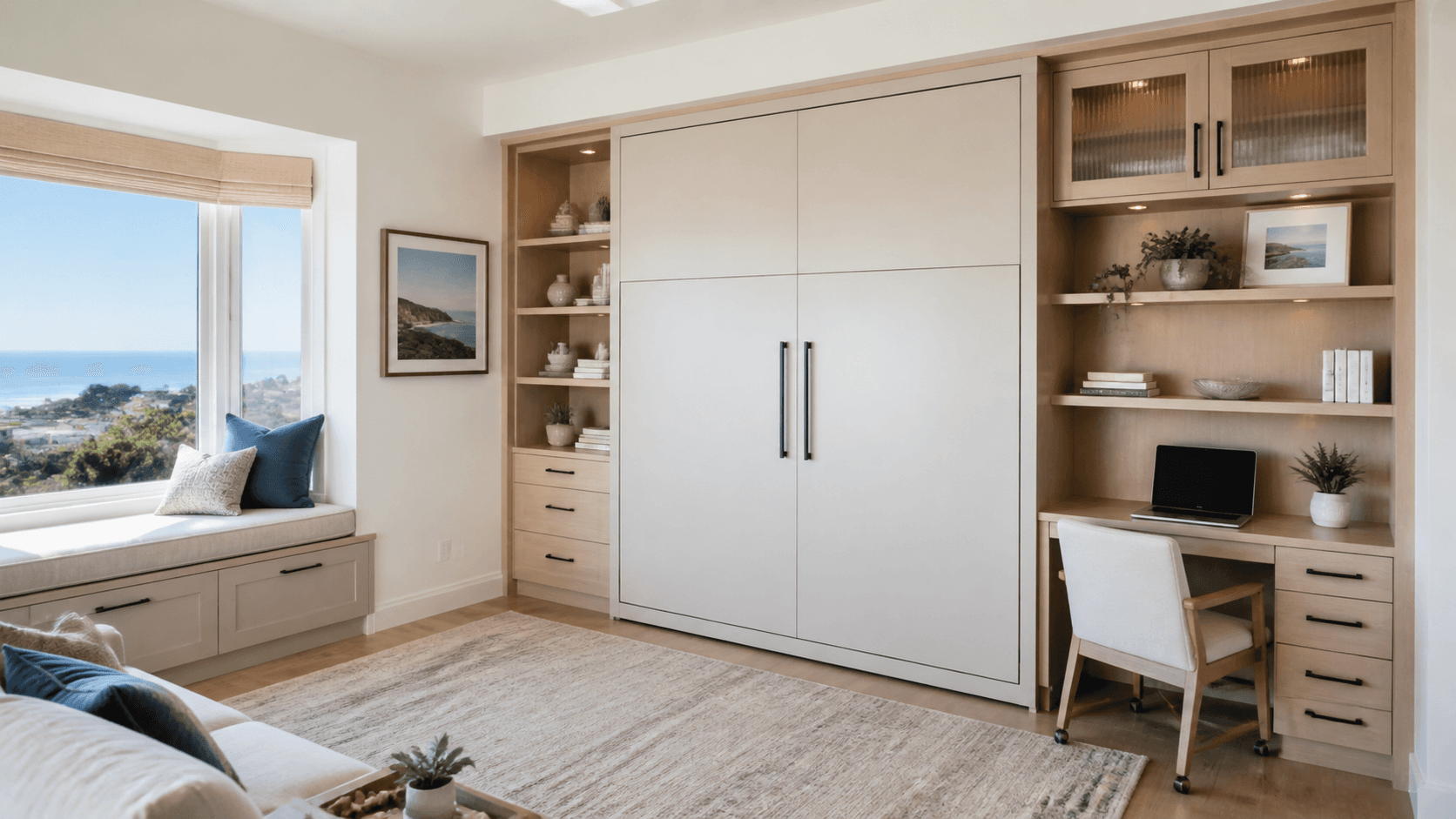 Illustrative guest room and home office with a closed modern wall bed, desk, and built-in storage.